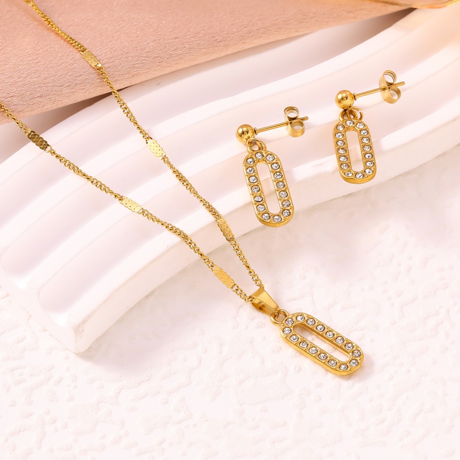 Luxurious sophisticated niche design diamond-studded jewelry set for women, stainless steel plated with 18K gold, oval necklace and earrings - view 4