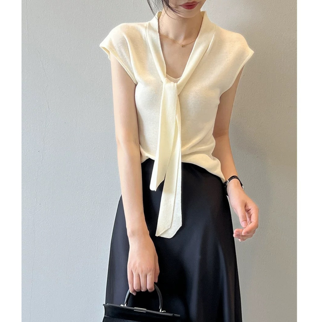 Designer Hoodie Light-colored Sleeveless Knit Top With Ribbons Polo And Designer T-shirt Curved Hem Women's Deconstructed Stylish Blouse Fashionable Artistic