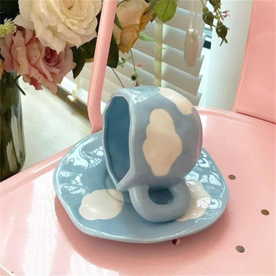 Creative small fresh underglaze color hand-painted white cloud coffee cup and saucer hand-squeezed irregular H260323
