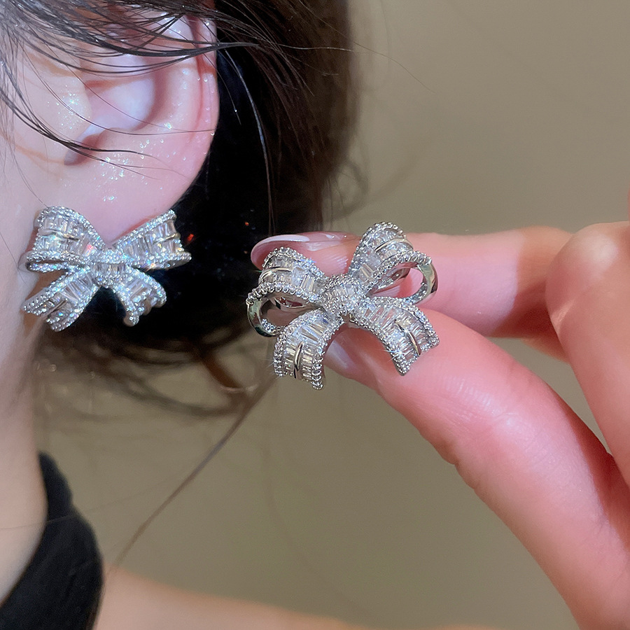 Falling Butterfly Silver Needle Zircon Bow Niche High-End Earrings, Exquisite Daily Commuting Ear Accessories for Women - view 3