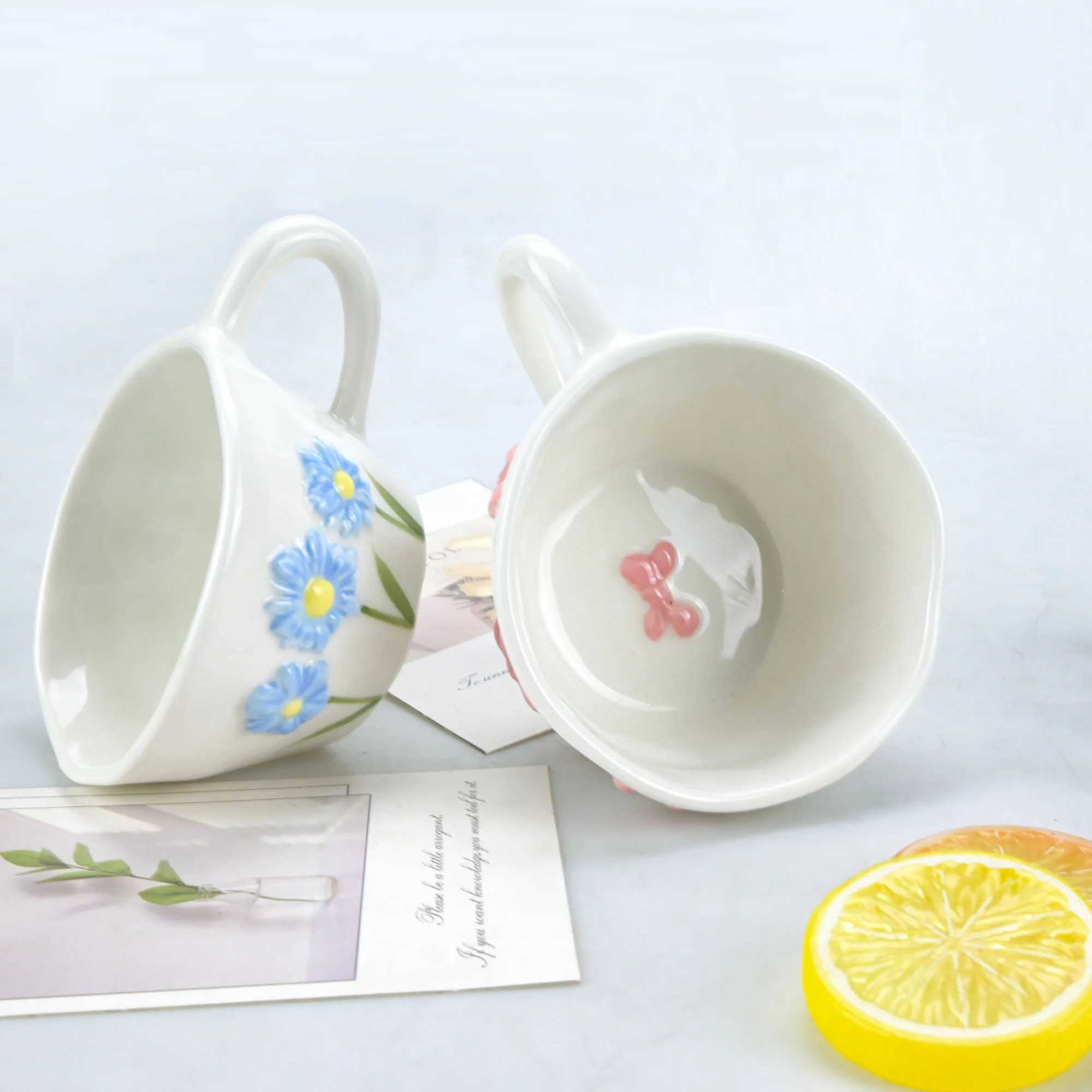 1pcs Irregular hand drawn underglaze color relief blue daisy pink bow ceramic mug water cup H260323