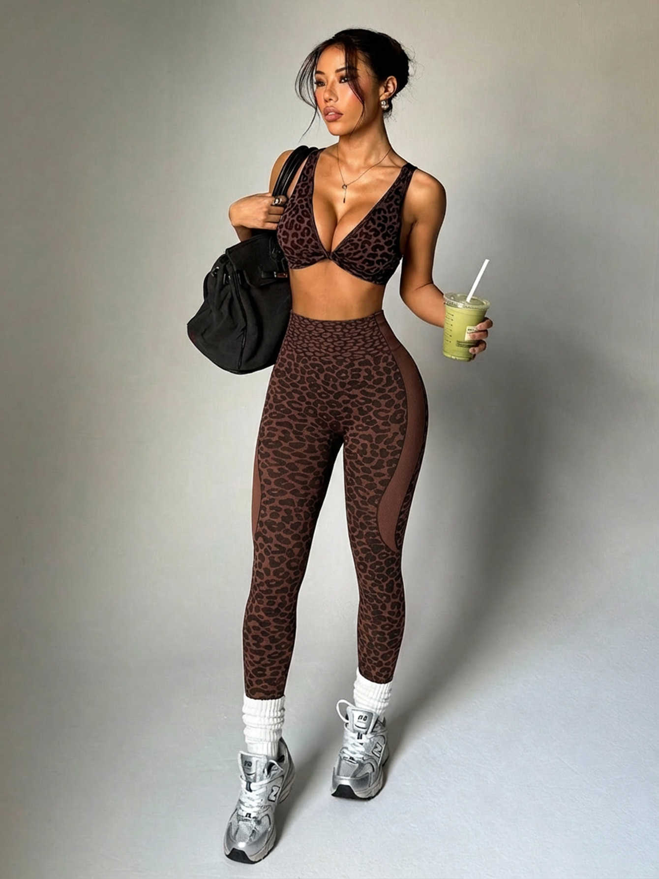 New leopard print yoga outfit for women with twisted back design suitable for fitness training outdoor running and sports includes long pants set