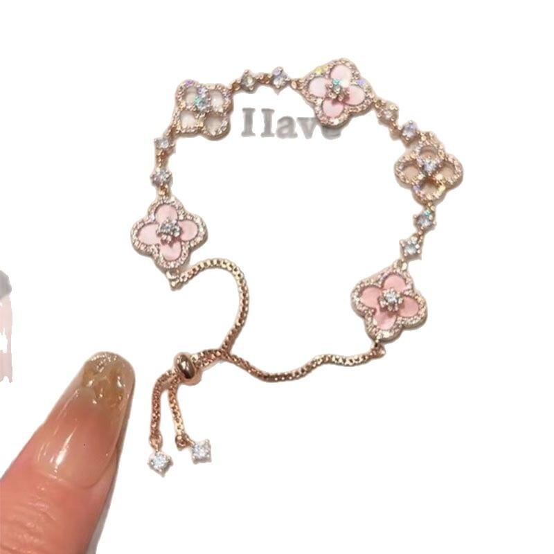 Designer's Luxury Pink Four Leaf Flower Sparkling Diamond Bracelet For Women,Light Luxury Bracelet High Grade Rose Gold Drawable Bracelet, Hand A