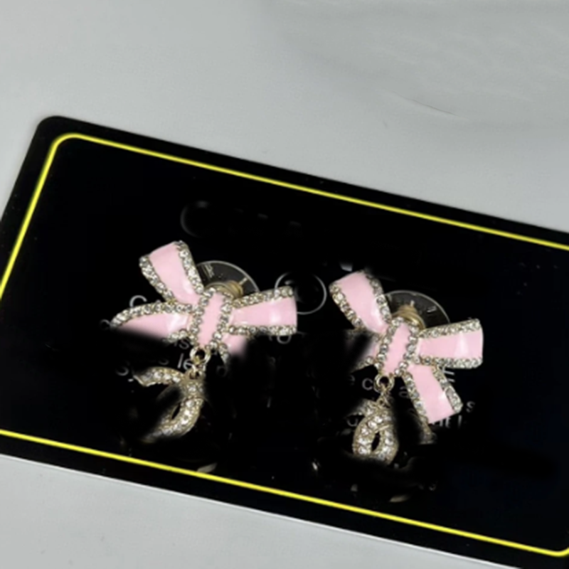 Chic Fashion Accessory: Channel-Inspired Pink Rosette Studs Set for Sophisticated Chic 70182724