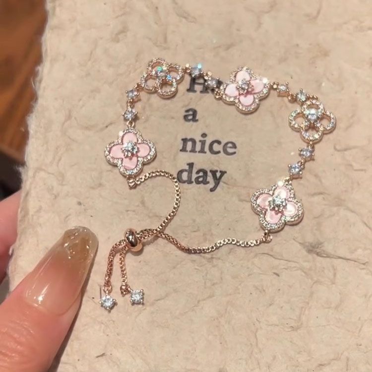 Designer's Luxury Pink Four Leaf Flower Sparkling Diamond Bracelet For Women,Light Luxury Bracelet High Grade Rose Gold Drawable Bracelet, Hand A