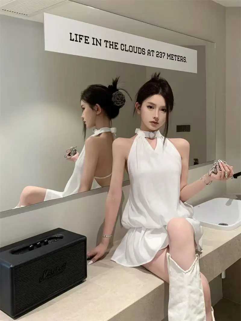 Y2Ks new solid-color halter-neck backless dress is a sexy elegant and slimming short skirt for women in summer M260326