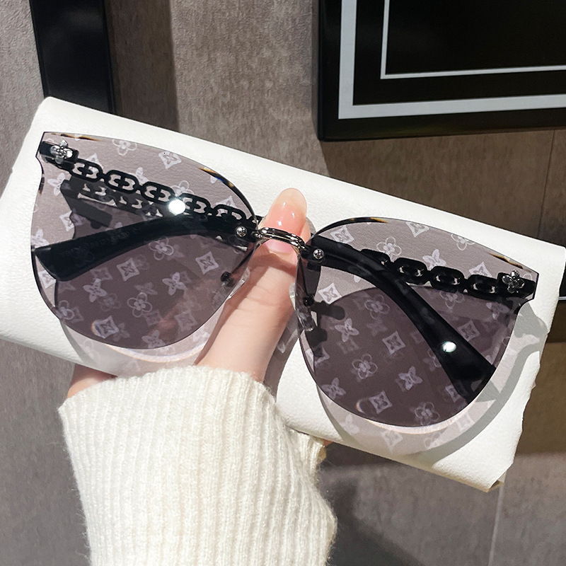 Luxury Brand Designer Sunglasses 2026 New Frameless Cut-Edge Lens Fully Printed High-End Sunglasses For Women, Little Red Book Style, Light Luxury Sun