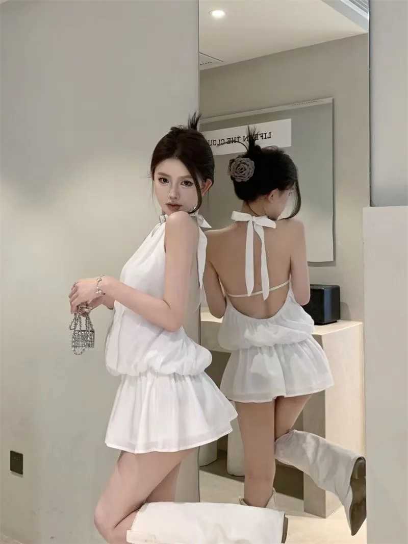 Y2Ks new solid-color halter-neck backless dress is a sexy elegant and slimming short skirt for women in summer M260326