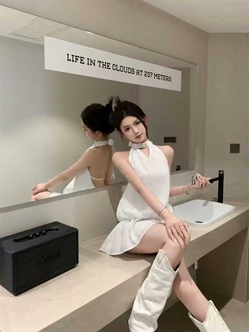 Y2Ks new solid-color halter-neck backless dress is a sexy elegant and slimming short skirt for women in summer M260326