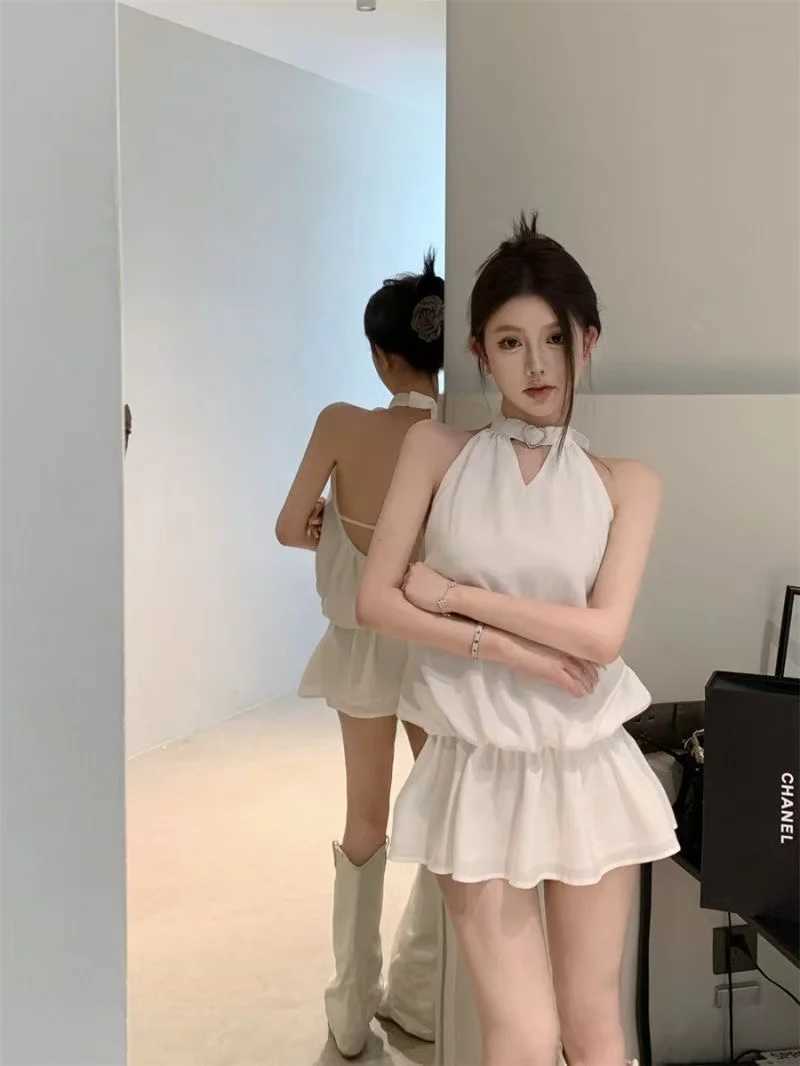 Y2Ks new solid-color halter-neck backless dress is a sexy elegant and slimming short skirt for women in summer M260326