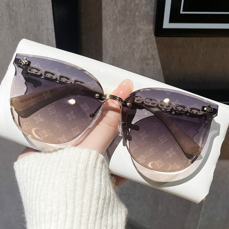 Luxury Brand Designer Sunglasses 2026 New Frameless Cut-Edge Lens Fully Printed High-End Sunglasses For Women, Little Red Book Style, Light Luxury Sun