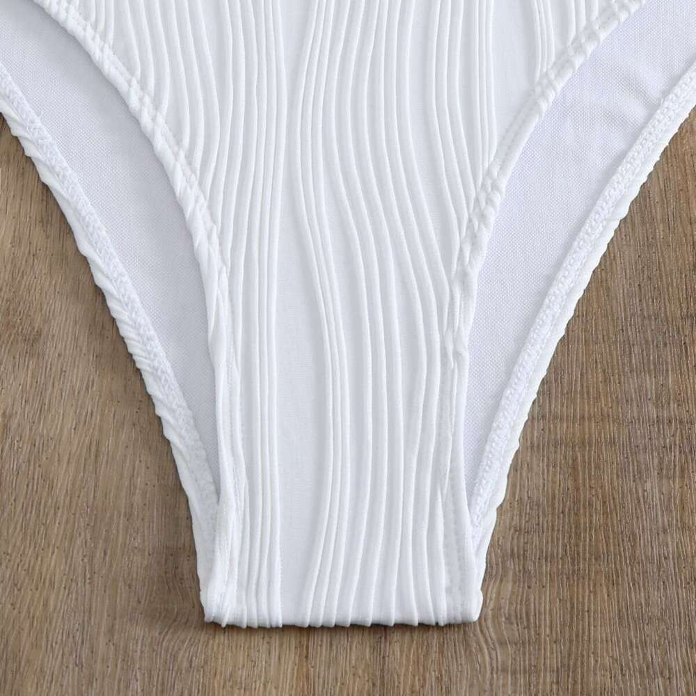 European and American fashion hot-selling one-piece swimsuit with hollow-out design, tie straps, and open back, popular one-piece bikini