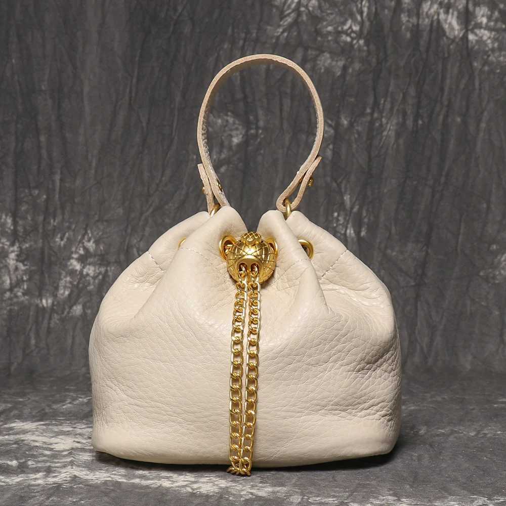 LUOKIR New Metal Drawstring Versatile Womens Handbag Genuine Leather Chain Crossbody Bag Vintage Bucket Bag Mobile Phone Bag C260327