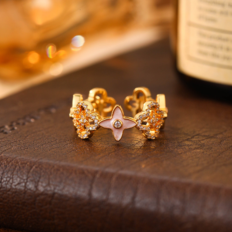 Luxury Brand Designer Jewelry Fashion Micro Pave Zircon Four-Leaf Clover Ring For Women Hollow Design High-End Light Luxury Open Ring Versatile Exquis - view 4