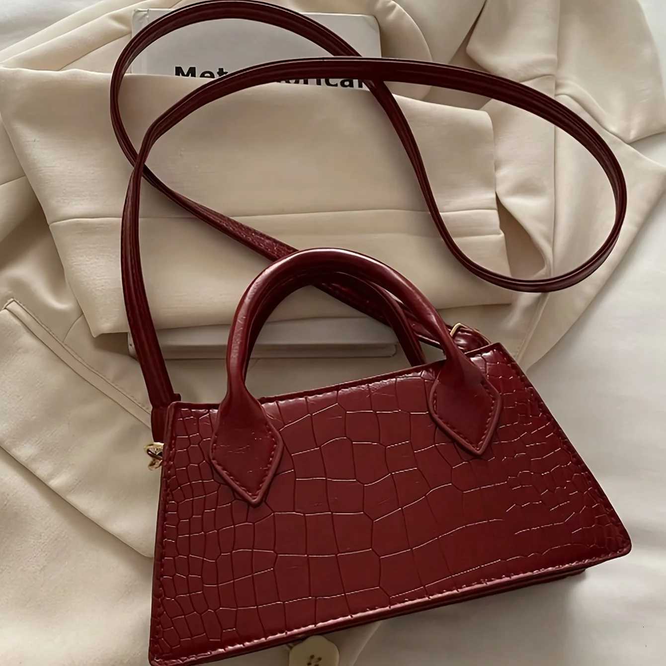 Burgundy Red Elegant Small Bag Adjustable Shoulder Strap and Zipper Closure Suitable for Travel and Daily Use C260327