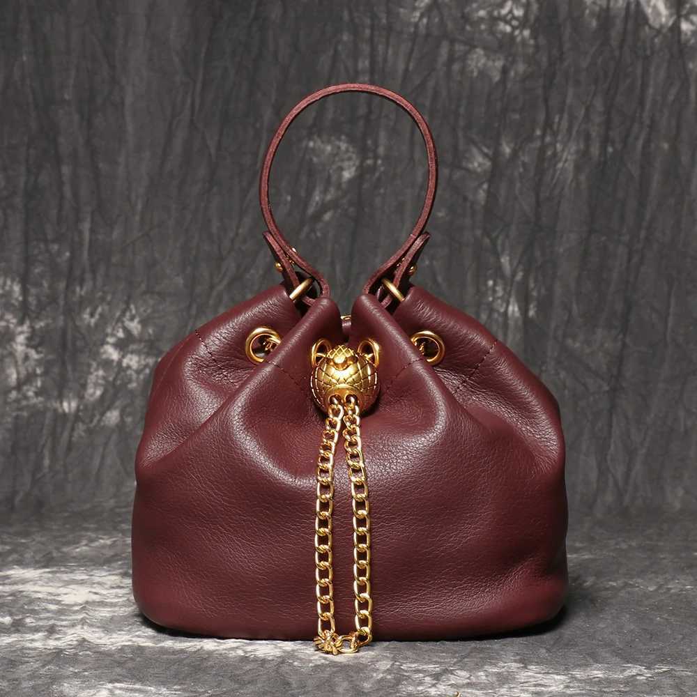 LUOKIR New Metal Drawstring Versatile Womens Handbag Genuine Leather Chain Crossbody Bag Vintage Bucket Bag Mobile Phone Bag C260327