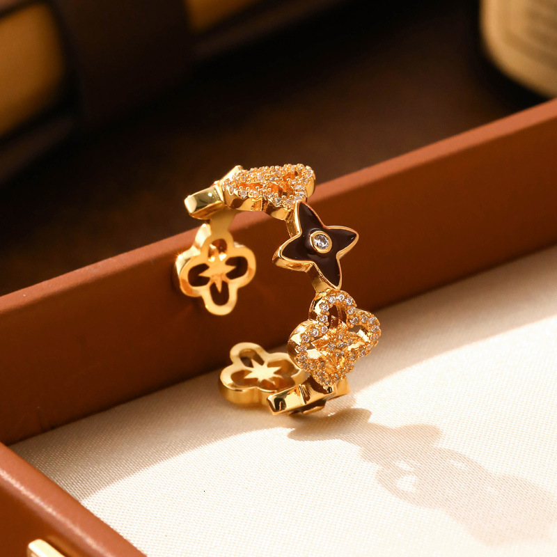 Luxury Brand Designer Jewelry Fashion Micro Pave Zircon Four-Leaf Clover Ring For Women Hollow Design High-End Light Luxury Open Ring Versatile Exquis - view 3