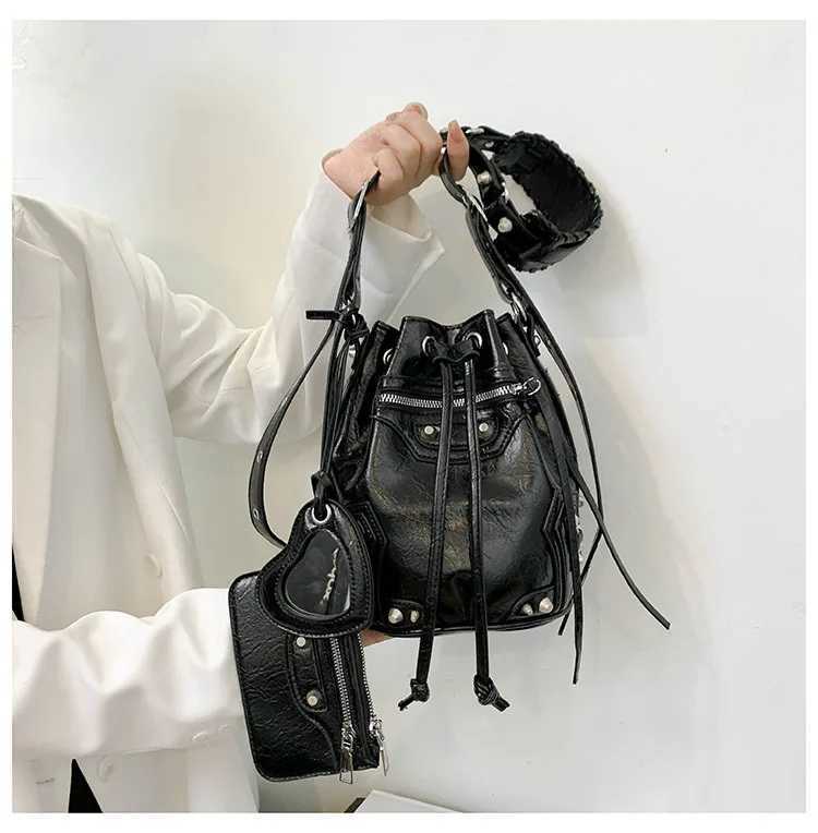 2025 Crossbody bag female new heavy industry locomotive wind rivet tide pump with bucket bag fashionable shoulder bag C260327