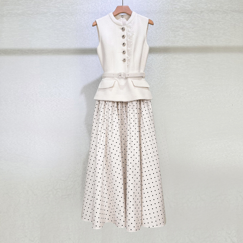 French-style elegant party attire, exquisite outfit tweed and polka dot details, waist-cinching dress with a large hem