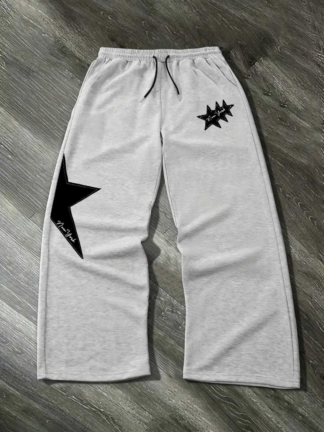 Mens Black Jogging Pants Text and Star Print Hip Hop Street Pants Drawstring Elastic Waistband Loose Casual Pants 2025 M260328