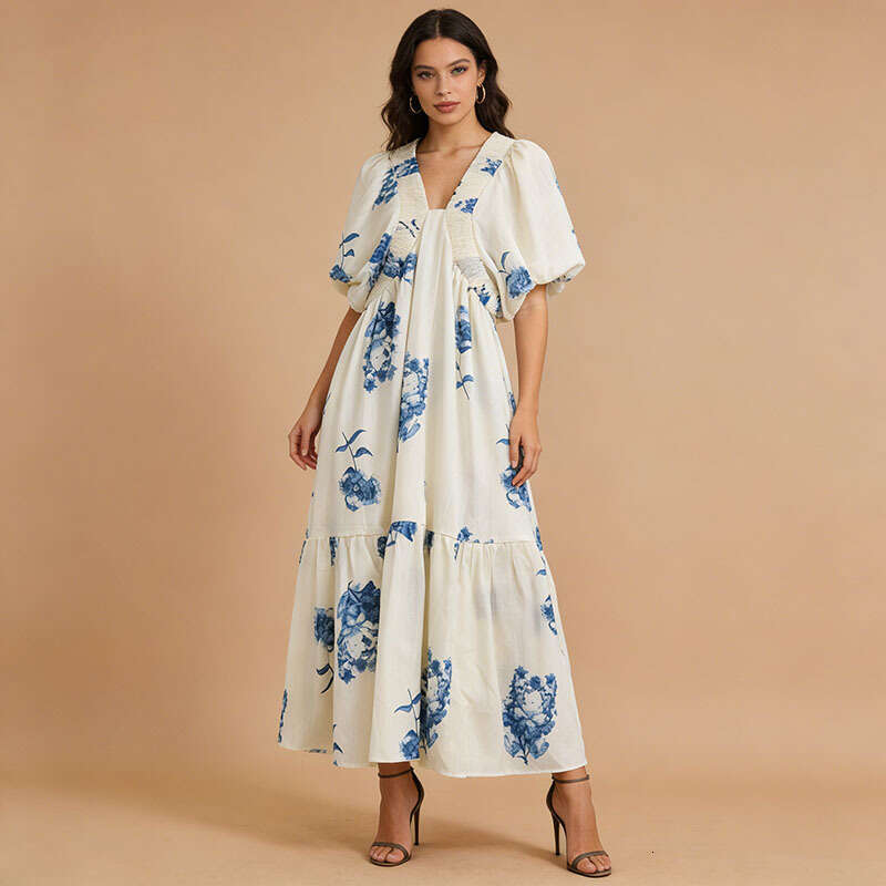 k30 2026 French style small FC fragrance style new designer deep V-neck bubble sleeves high waist A-line large hem printed long skirt