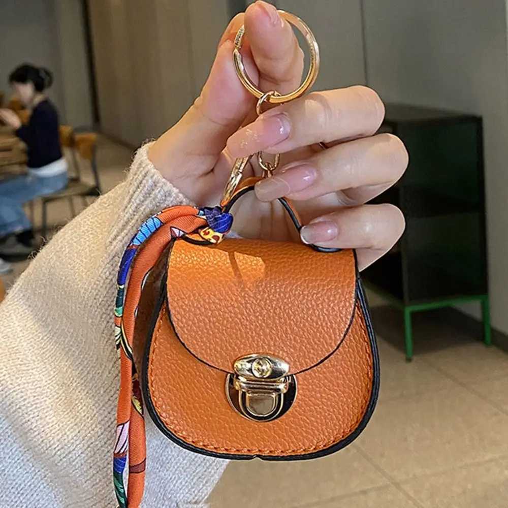 2026 NEW Fashion Keychain Small Coin Purse Premium Leather Multifunction Mini Storage Pouch Earphone Bag for Women Z260330