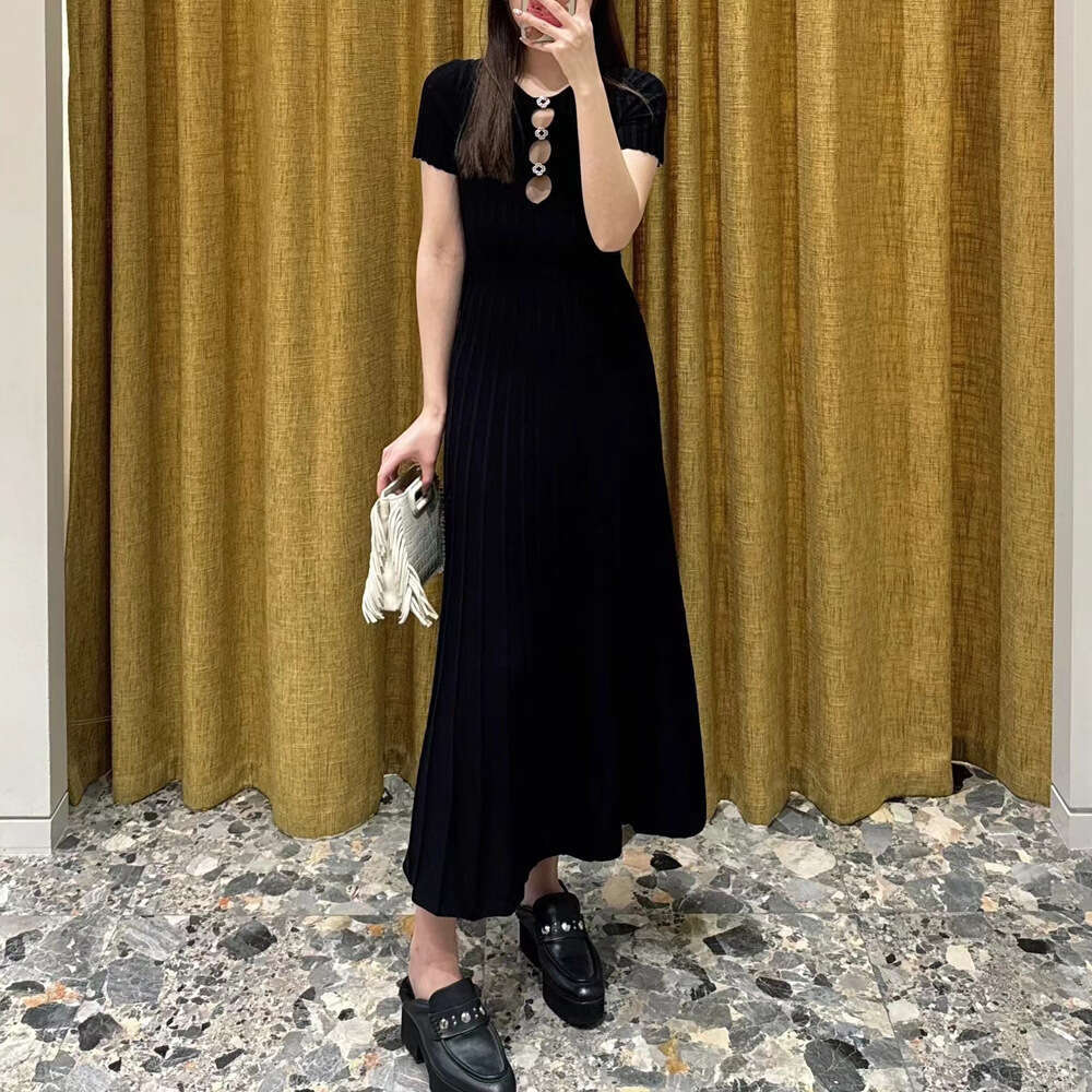 2026 Spring New Designer French Elegant Ribbed Hollow Waist Black Short Sleeve S18 Knitted Women's Dress