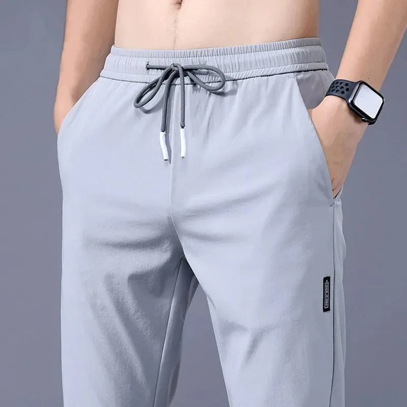 Ice Silk Mens Pants Summer Black Gray Thin Business Casual Pants Outdoor Elastic Breathable Straight Leg Sweatpants 260330