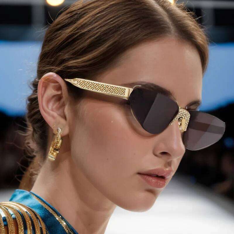 New Fashion Frameless For Women With Hollow Metal Sunglasses Cat Glasses 90259 26Y0330