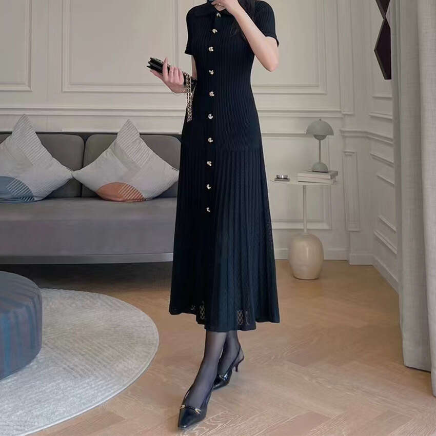 2026 summer French niche hollow slit long knitted women's A1 black small skirt with buttons and folding collar