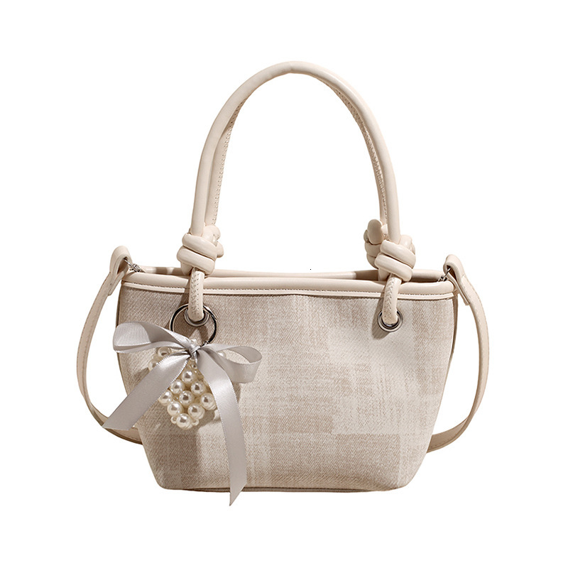 Casual, simple, and sweet bucket bag for women, 2026 spring new fashion trendy crossbody bag, simple commuter handbag
