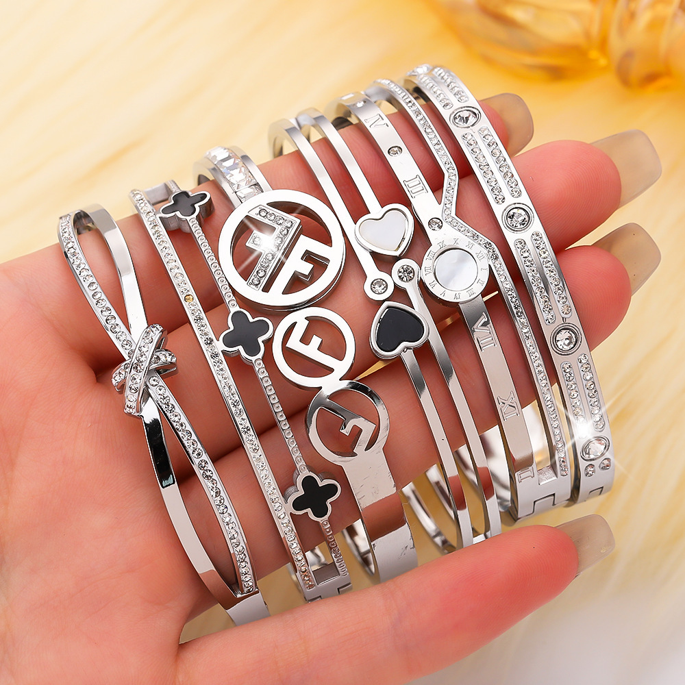 Luxurious Brand Designer Titanium Steel Fashionable Daily Wear Bracelet Golden Egg-shaped Clasp Open Gold Bracelet High-end Stainless Steel Bracelet