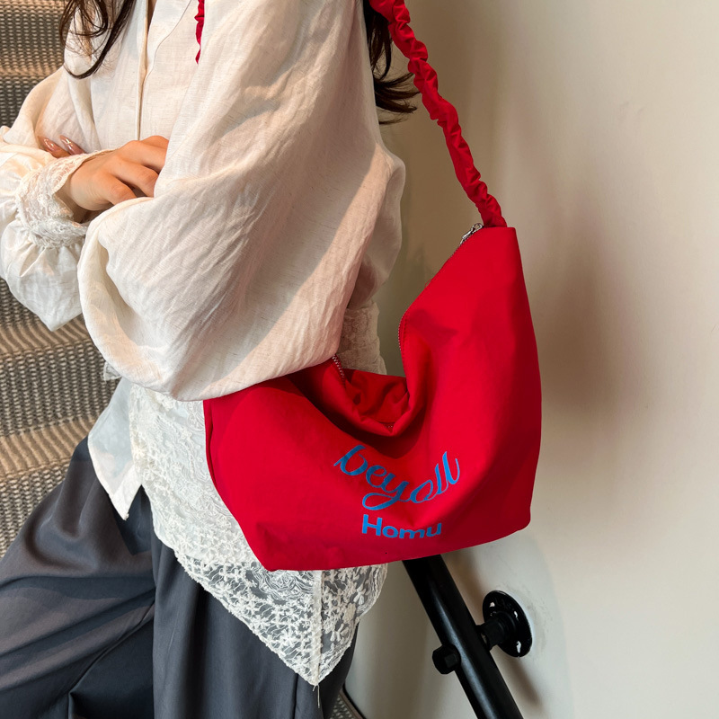 2025 Striped Korean-style casual canvas bag, large capacity, simple and versatile for commuting, single-shoulder tote bag