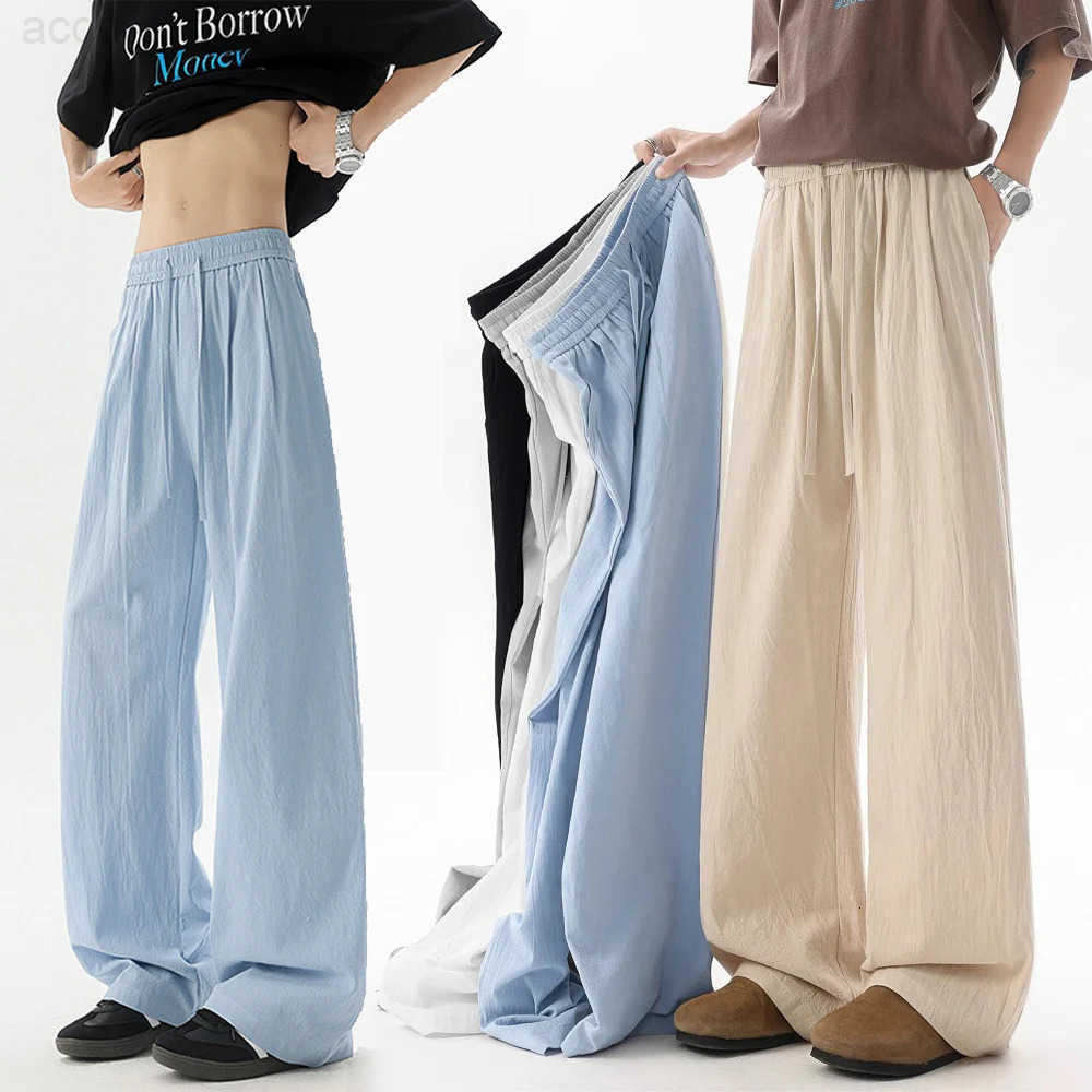 2026 New Trousers Chinese style mens cotton linen casual crotch pants ethnic style plus size cotton and linen wide leg pants H260330