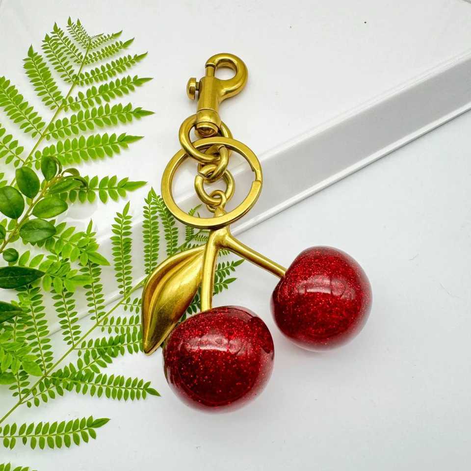 Trendy Red Cherry Pendant Keychain for Women Cute Bag Decorations Multifunctional Jewelry Car Key Accessories Charm Keyring Gift Z260330
