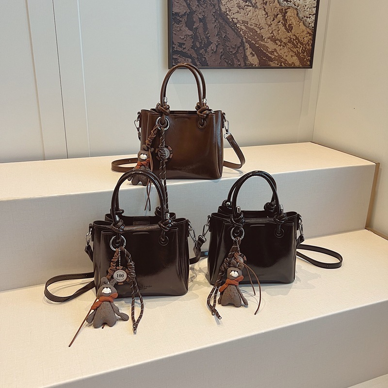 Free Shipping High Value Mini Tote Bag for Women Glossy Leather Handbag with Cute Bear Charm