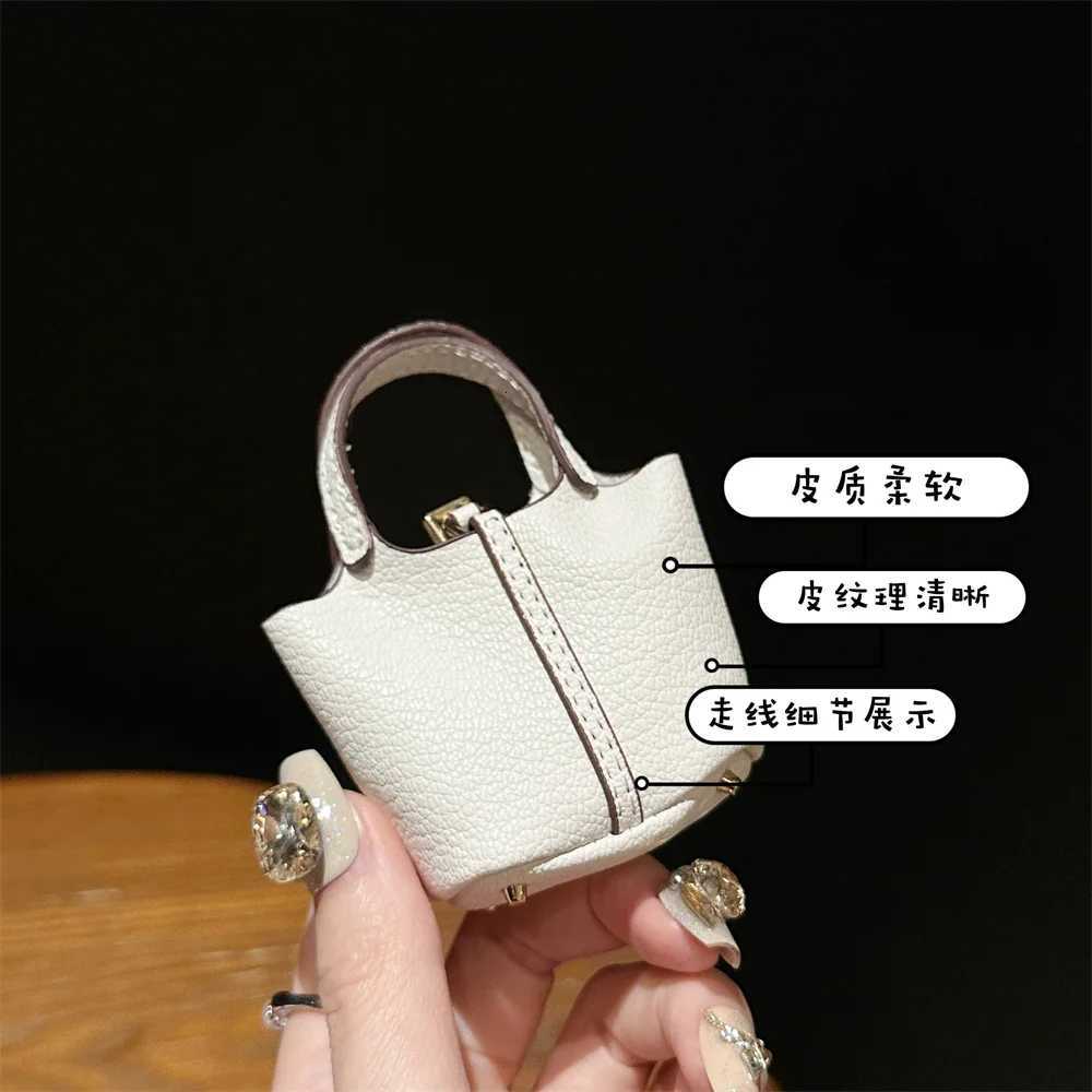 2024 New style Mini House Small Bag Handheld Portable Hand Rope Bluetooth Earphone Bag Zero Wallet Multi functional Small Bag Z260330