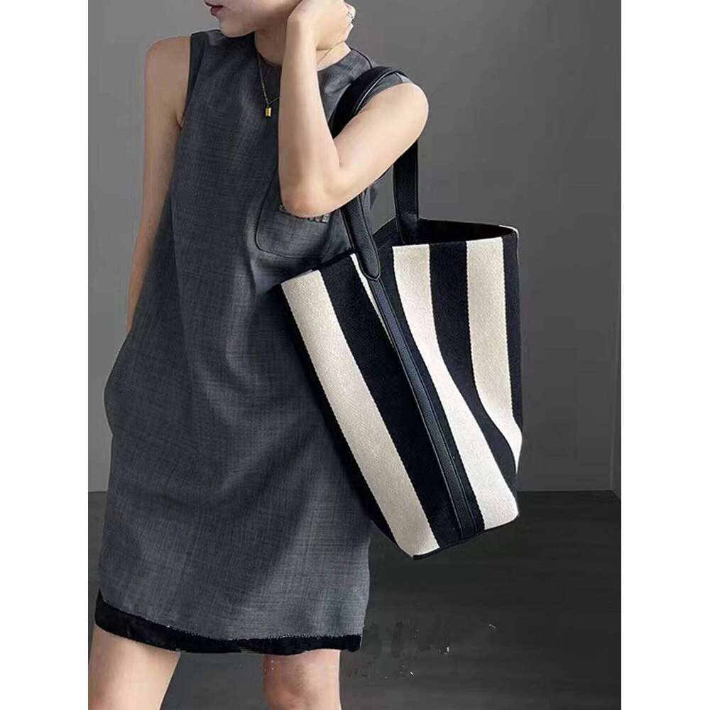 Niche Striped Canvas Bucket For Women Capacity Lazy Style Commuting Tote Bag New Single Shoulder Large Bag Trend XIU LAI SI