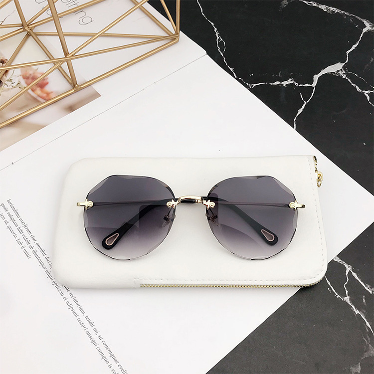 Fashionable Frameless Women's Designer Sunglasses Luxury Accessories Internet Famous Street Photography Large Frame Outdoor Sun Protection Cyclin