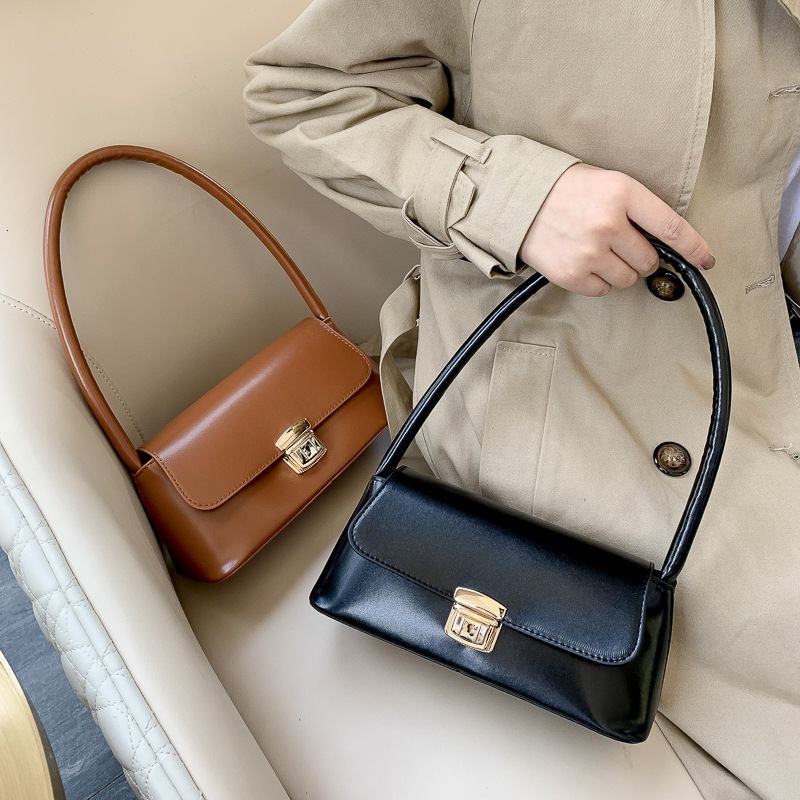 Free Shipping High Value Leather Baguette Bag for Women Vintage Lock Shoulder Bag