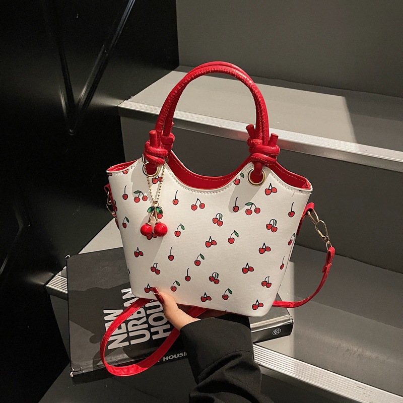 New Fashion Commuting Cute Pendant Large Capacity Printed Texture One Shoulder Underarm Handbag Bag 2026s hot
