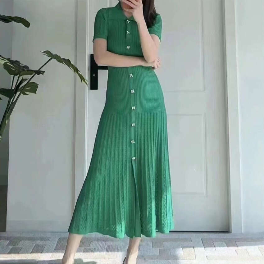 2026 summer French niche hollow slit long knitted women's A1 black small skirt with buttons and folding collar