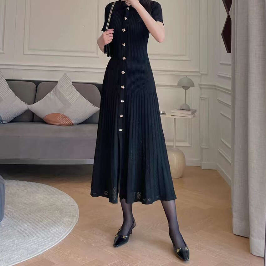 2026 summer French niche hollow slit long knitted women's A1 black small skirt with buttons and folding collar