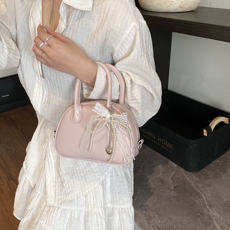 Korean Handheld Bowling for Women 2025 New Trendy Fashion Shell Niche Versatile Crossbody Bag