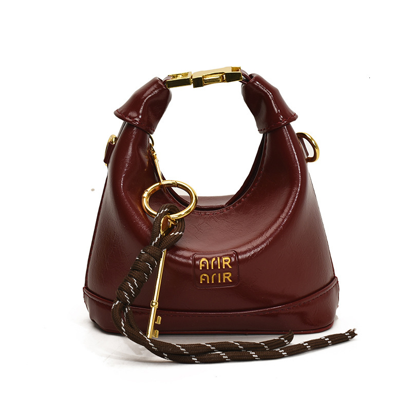 Free Shipping High Value Mini Hobo Bag for Women Glossy Leather Handbag with Key Charm Adjustable Strap