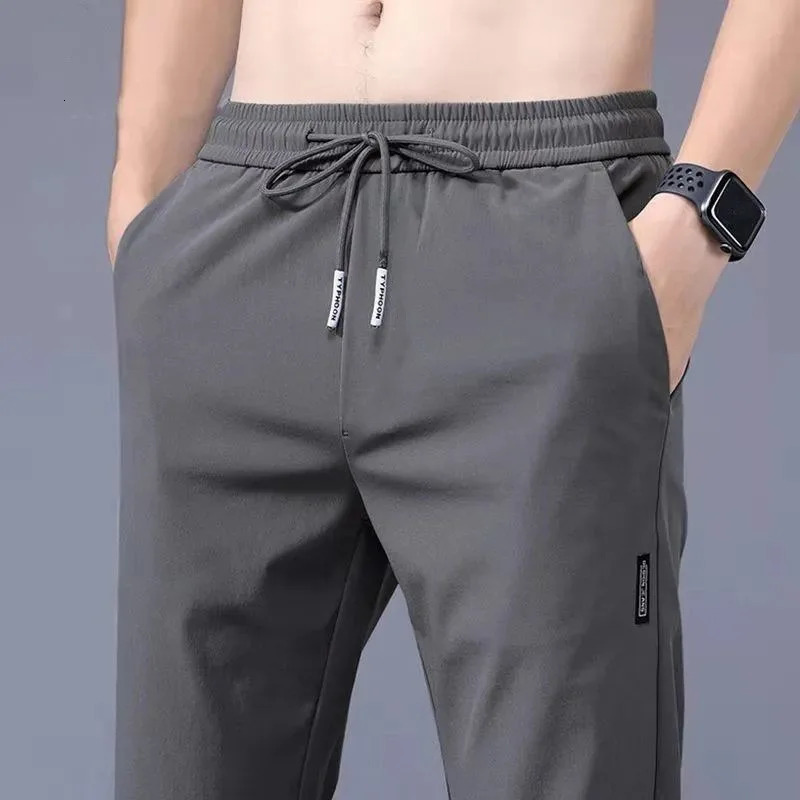 Ice Silk Mens Pants Summer Black Gray Thin Business Casual Pants Outdoor Elastic Breathable Straight Leg Sweatpants 260330