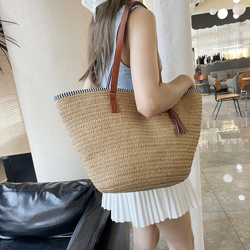 Free Shipping High Value Large Capacity Straw Tote Bag for Women Beach Bag with Leather Handle Tassel Decor