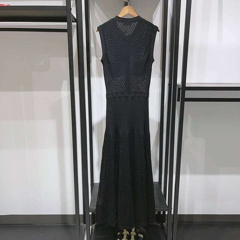 Women Single Breasted Knitted Dress Autumn Winter Slim Female Elegant A-Line O-Neck Black Sleeveless Long Robe Mdng260330