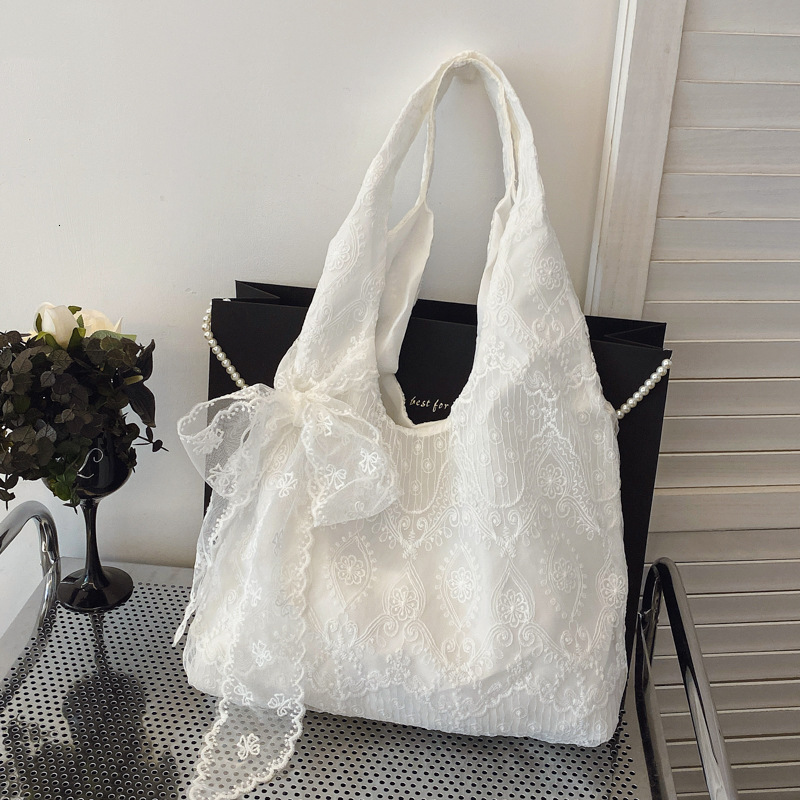 Free Shipping High Value Lace Embroidery Shoulder Bag for Women Cute Bowknot Tote Bag Casual Beach Handbag