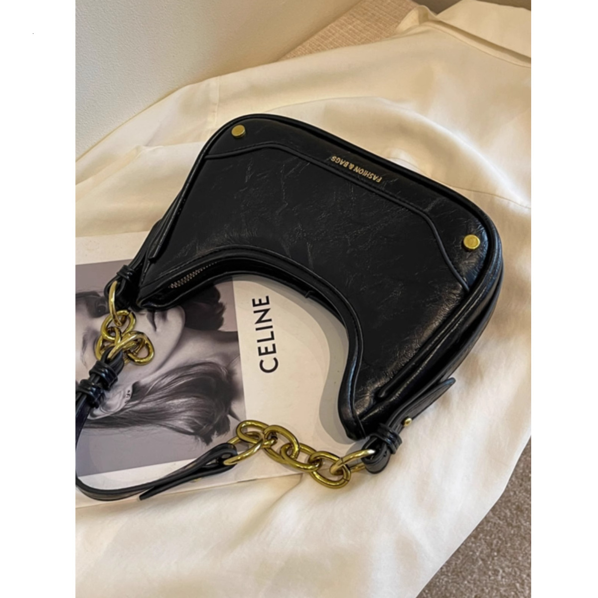 high-end women's bag 2025 new model, textured crossbody niche single-shoulder underarm crescent bag, spring-summer vintage style